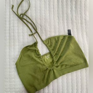 Out from under green crossover tie top